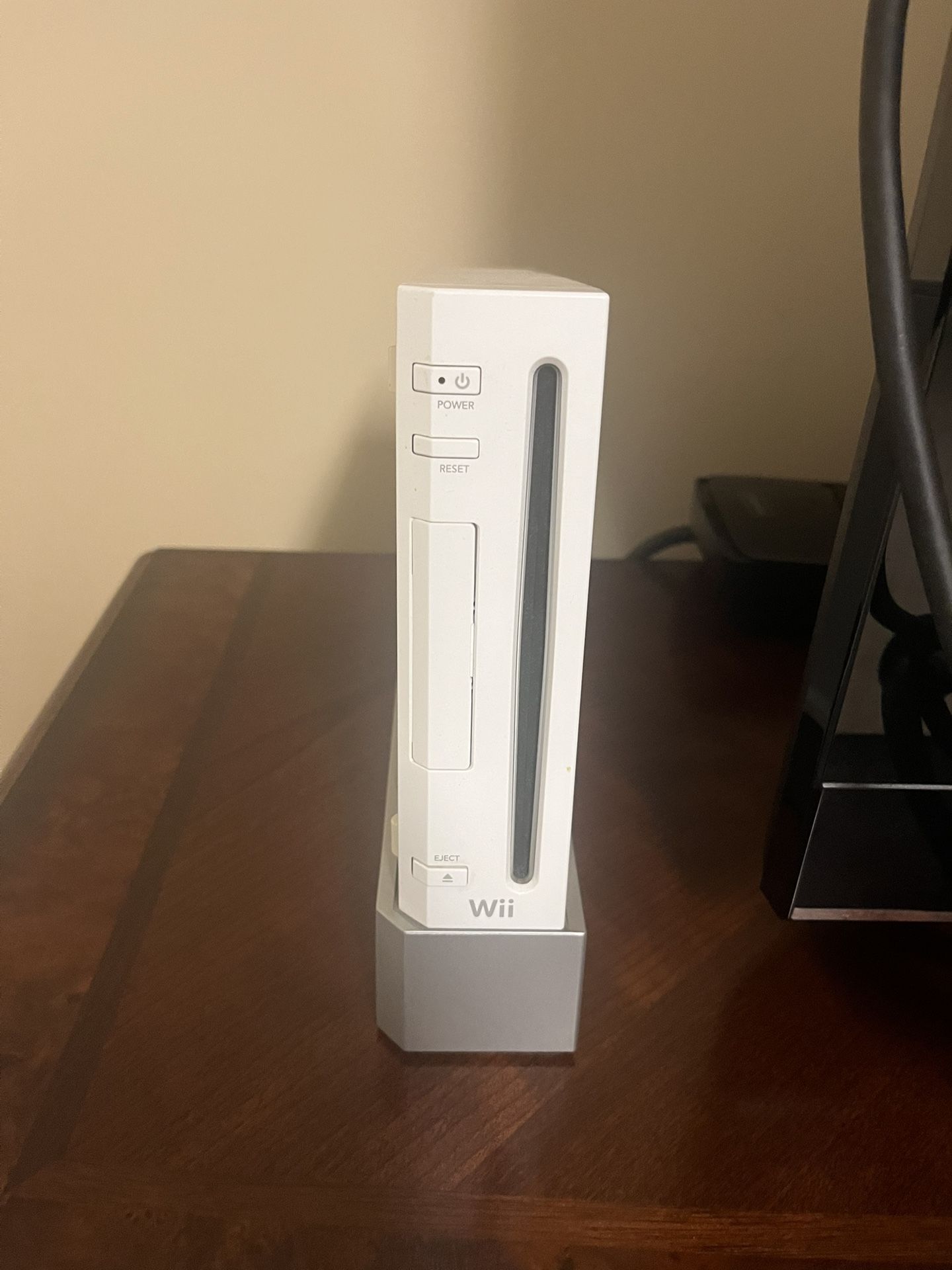 Wii Console With Remotes And Games