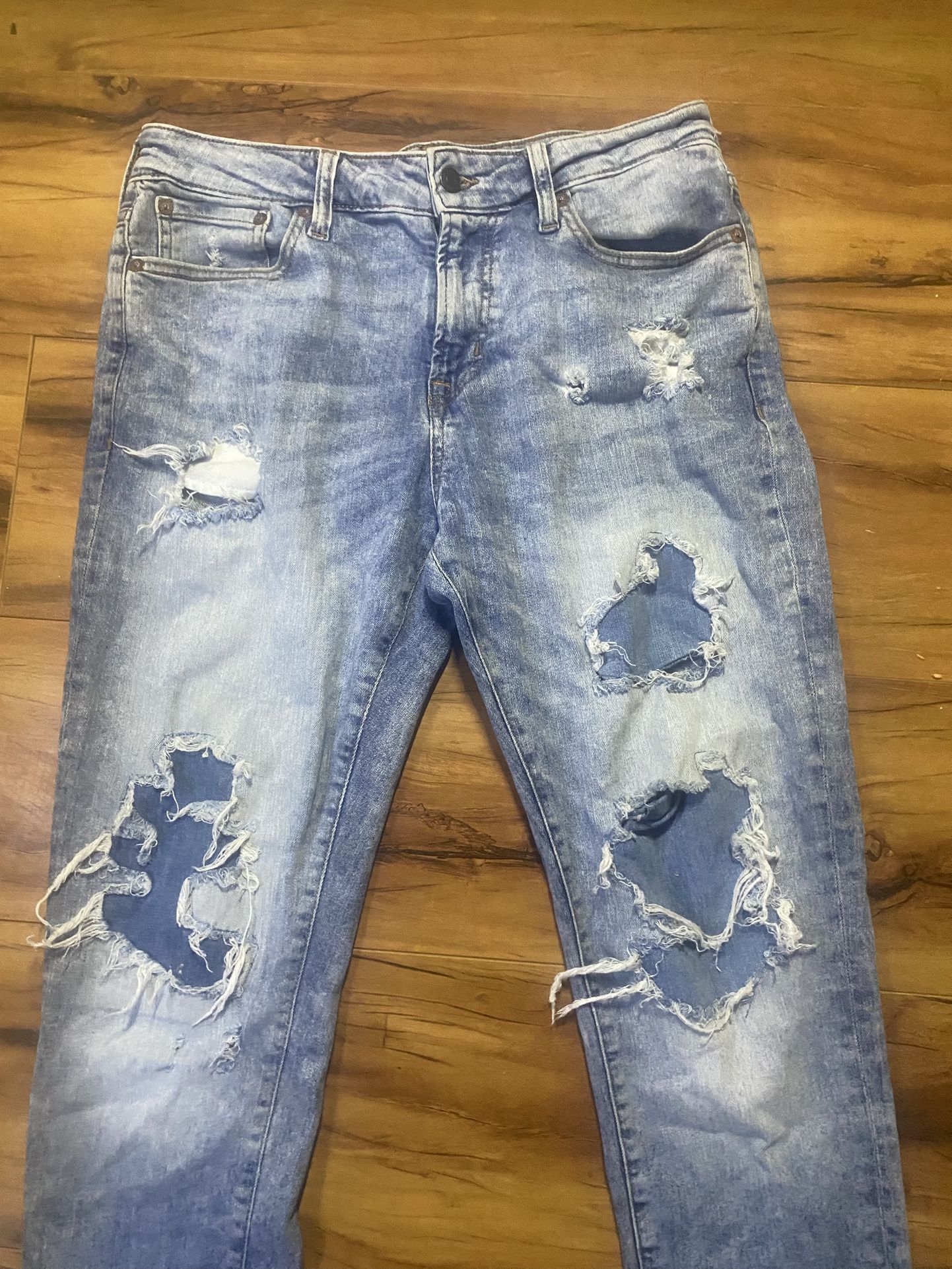 Light blue wash ripped skinny jeans 