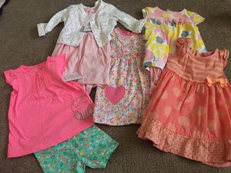 Baby girl dresses. Never used. 6-12 months