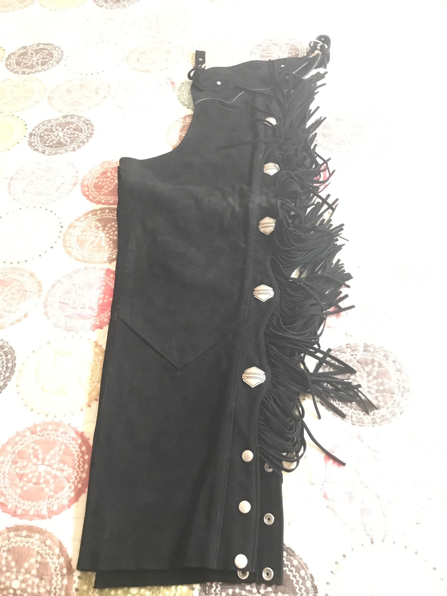 Harley Davidson black suede fringed chaps with bar & shield conches.
