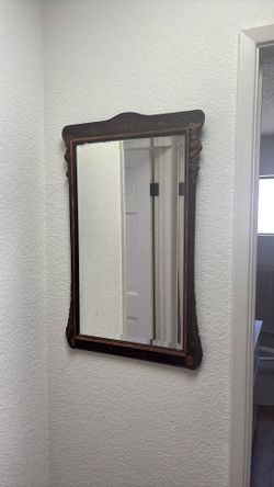 ORNATE ANTIQUE MIRROR