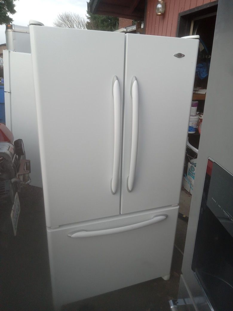 20 cubic foot Maytag refrigerator Water and ice inside. 90 day warranty. Free delivery Vancouver area.