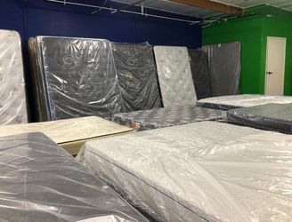 New Mattresses in Plastic Wrap