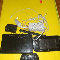 Wii U with controller and game pad. Games cost extra. 