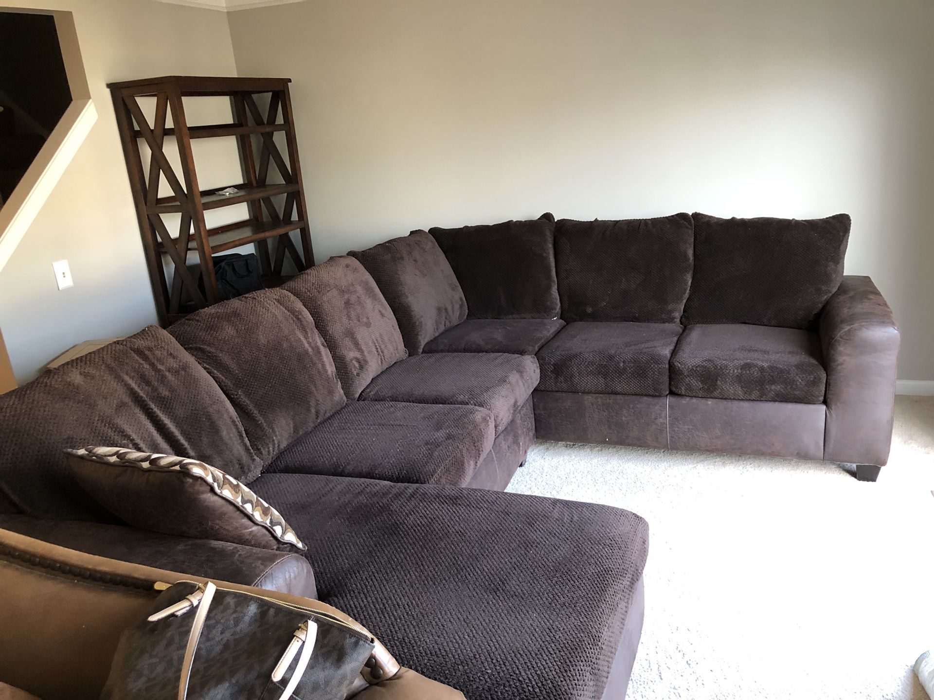$1200 brown couch with leather lining
