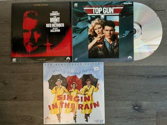 3 Laser Discs: Top Gun, Singing In The Rain, & Hunt For Red October