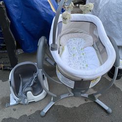 Graco dual glider  bassinet with booster seat