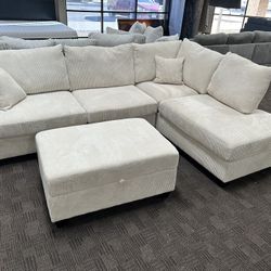Cream Sectional W/ Storage Ottoman