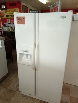 Whirlpool Side by Side Refrigerator White ex large beautiful . Warranty . Delivery available . 2203 Fowler st. Ft. Myers 33901