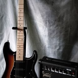 Brand new electric guitar with new 20 watts amp bag and cable