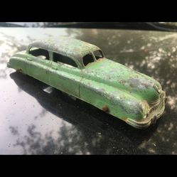 1930’s-1940’s metal toy car, 6” long, stamped USA under roof.  $20