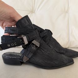 Women’s size 10 leather shoes by Free People in a cowboy-inspired style