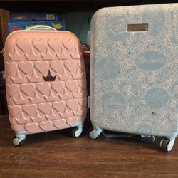 Gently Used Cinderella Rolling Suitcases.  