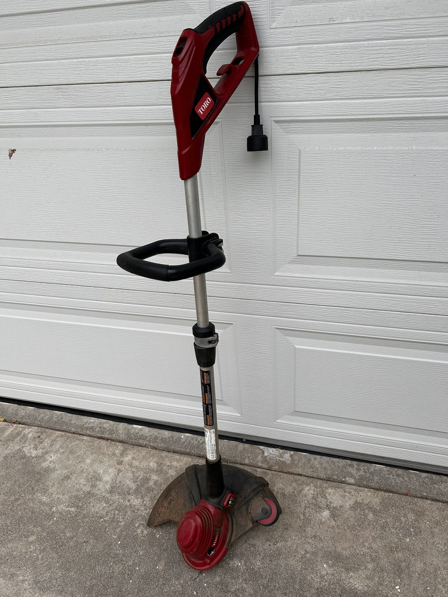 Toro corded 14 inch electric trimmer/edge, red/silver