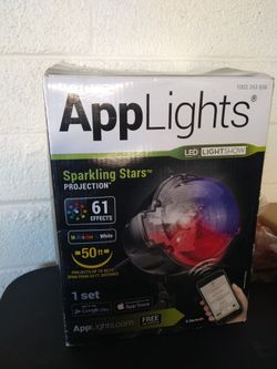 LED Sparkling spot light projector, Stars-61 Programs 49658. control with app on your tablet or smartphone to remotely turn it on or off, no tripod. 
