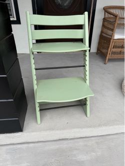 Stokke — Tripp trapp  high-end adjustable kids chair.