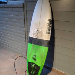 Various surfboards and board bags for sale