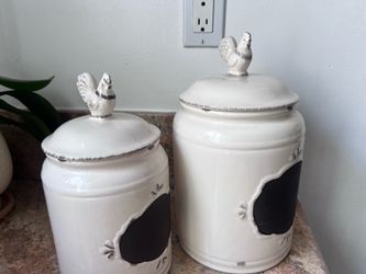 Two ceramic canisters