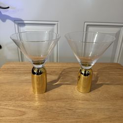 A set of two wine 🍷 glasses Or Juice  🥤 Glass with a gold base and a clear glass; it makes a wonderful gift for Christmas or the holidays.