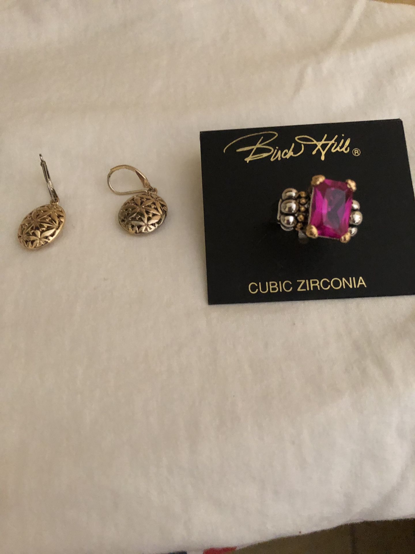 Gold Earrings and a Ring