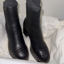 Brand New CHANEL Black Leather Chelsea Boots with Gold Chain Trim
