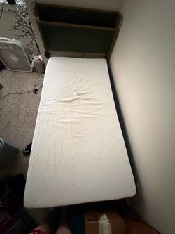 Twin sized mattress with frame