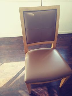 Table. 8 chairs lighted China. Heavy need. 2 to 3 to pick up. Leather wood chairs must sell.asap. . By appointment located Jamaica Bay. 1,800 or bof