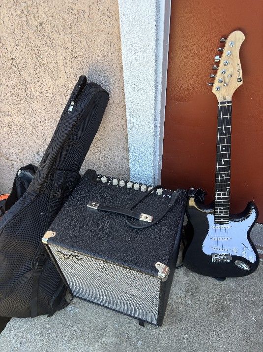 Fender Rumble Amp And Guitar