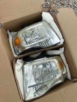 OEM - 2007 2014 FORD EXPEDITION HEADLIGHTS PAIR 