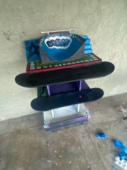 Skateboard park / self / skate board holder