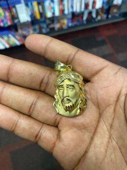 14k Jesus Piece Charm 100$