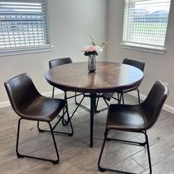 Signiture Design by Ashly Centiar Round Dining Table with Metal Hairpin Legs 