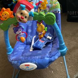 Baby Carrier Bounces Play Music, Vibrates Takes 4 D Batteries. Price 19$. Pick Up. E. Side. Tacoma 