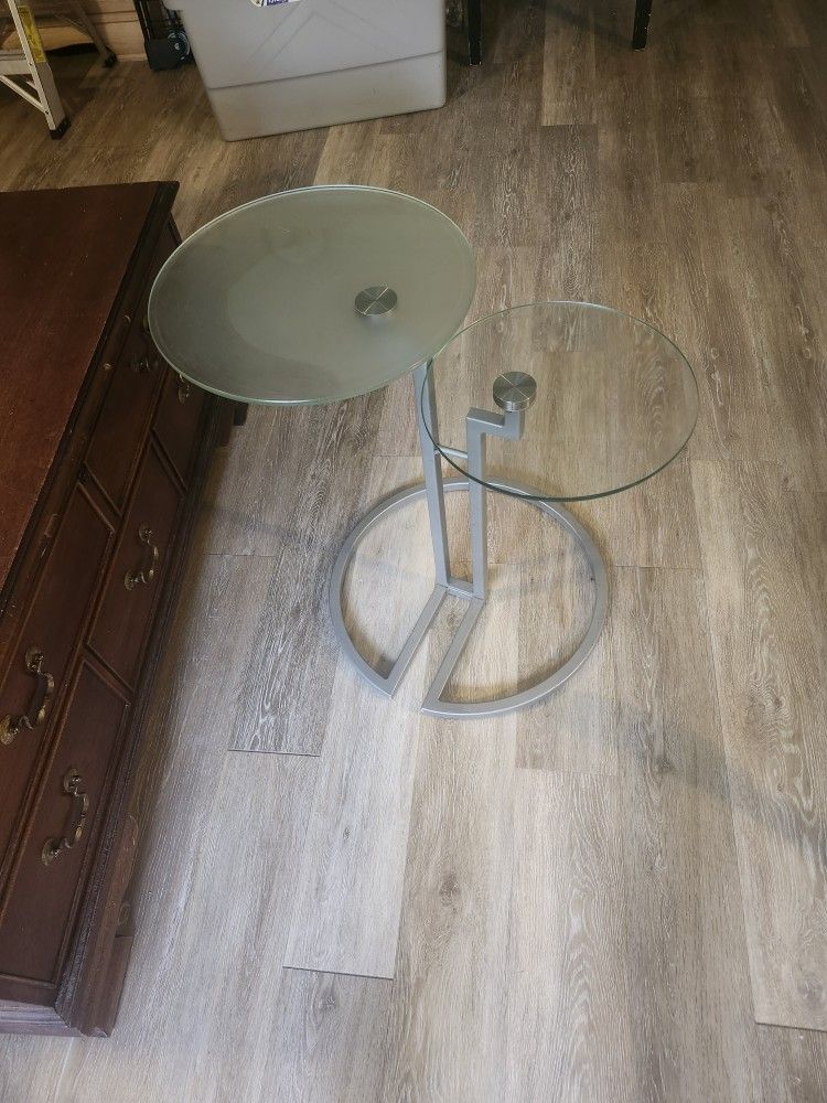 Modern round, end table glass and metal.