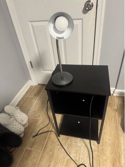 Nightstand with outlets and lamp