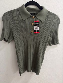 Blusa tipo polo