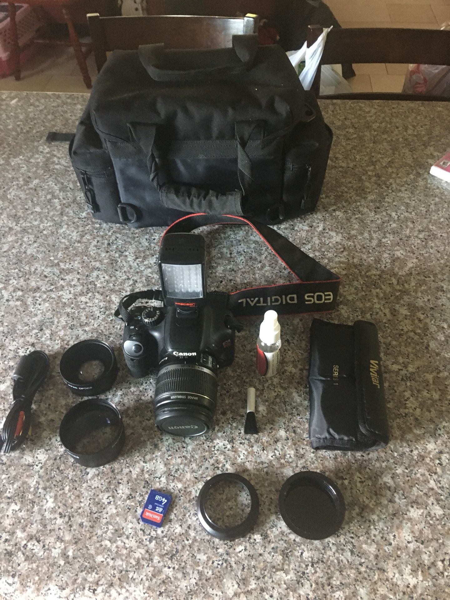 Cannon EOS T2i with 0.54x 58mm wide angle & 2.5x telephoto lenses I
