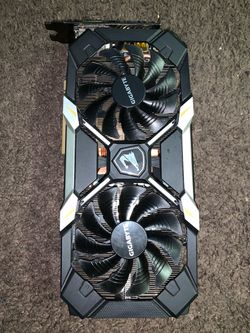 Gigabyte GeForce GTX 1060 Aorus Xtreme Edition graphics card and a AOCHUAN Smart XE 3-axis smartphone stabilizer