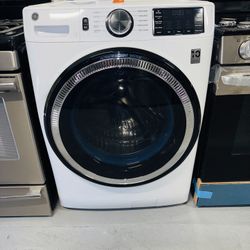 GE washing machine in perfect condition, includes a receipt with a 60-day warranty