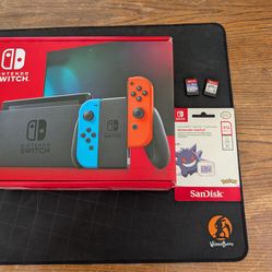 Nintendo switch complete inbox with 512 GB MicroSD and two games