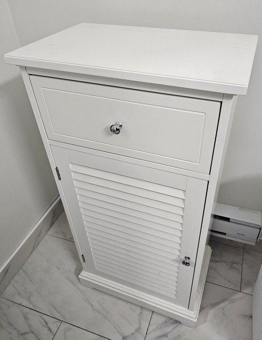 New, never used white drawer and adjustable 2 shelve cabinet.