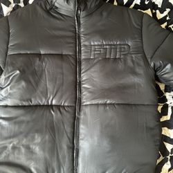 FTP PUFFER JACKET SIZE L OR XL 