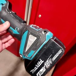 Two Makita Grinders Plus Battery