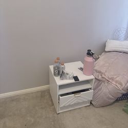 White side dresser with lights inside