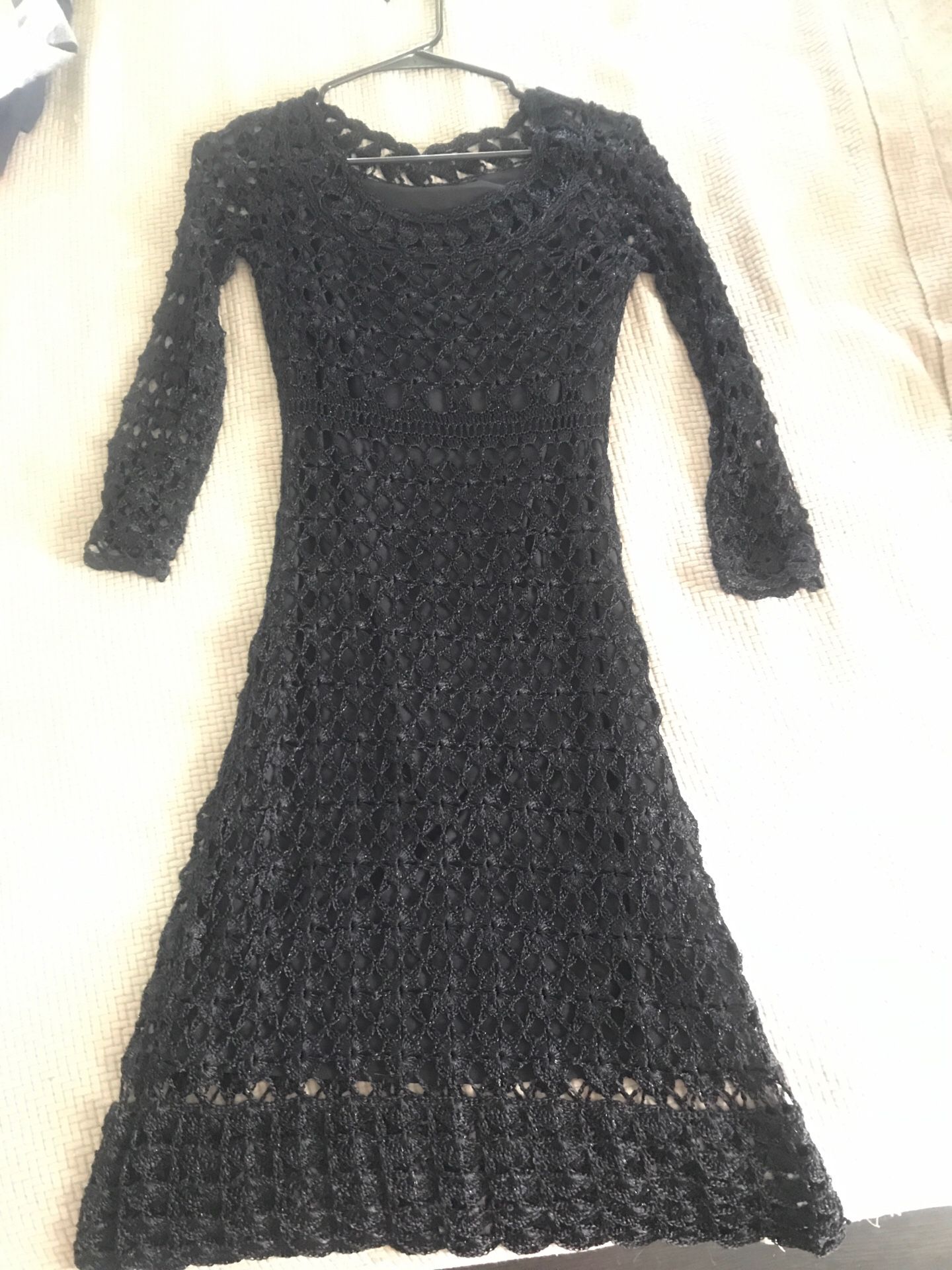 Black lace cocktail dress. Ladies size small, very gently used.