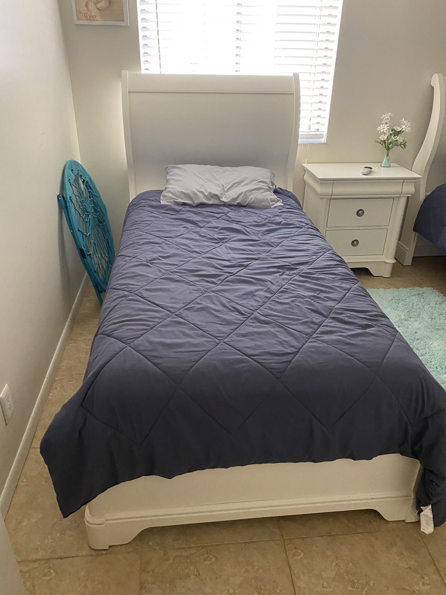 White twin beds with mattress included