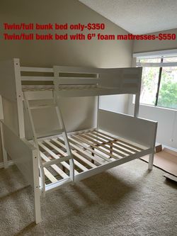 Twin/full bunk bed. Available in black & white. Tax included . Free local delivery .  $350 for bunk bed only. $550 with mattresses.  Assembly required