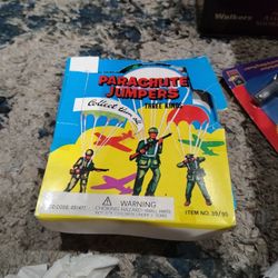 A Box Of Parachute Jumpers From The 1950s