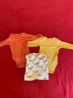 Children’s onesies Free with any purchase 6 months