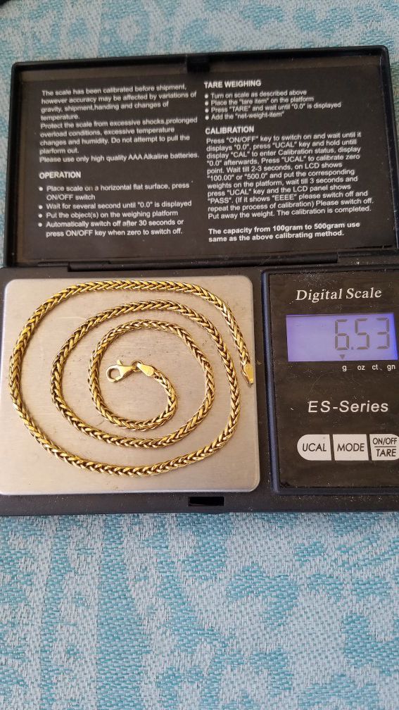 18k new real gold chain 6.53 grams. 18 inches long. 2.5mm. firm price. hablo español. oro